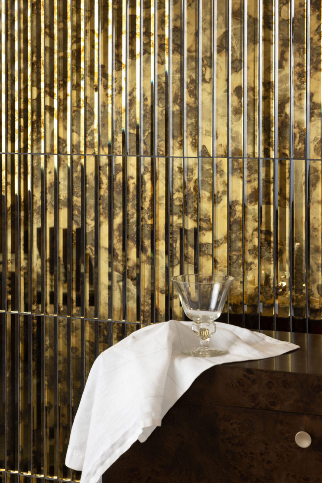 Regency 1" x 12" Antiqued Gold Stacked Mosaic Installed as Accent Wall