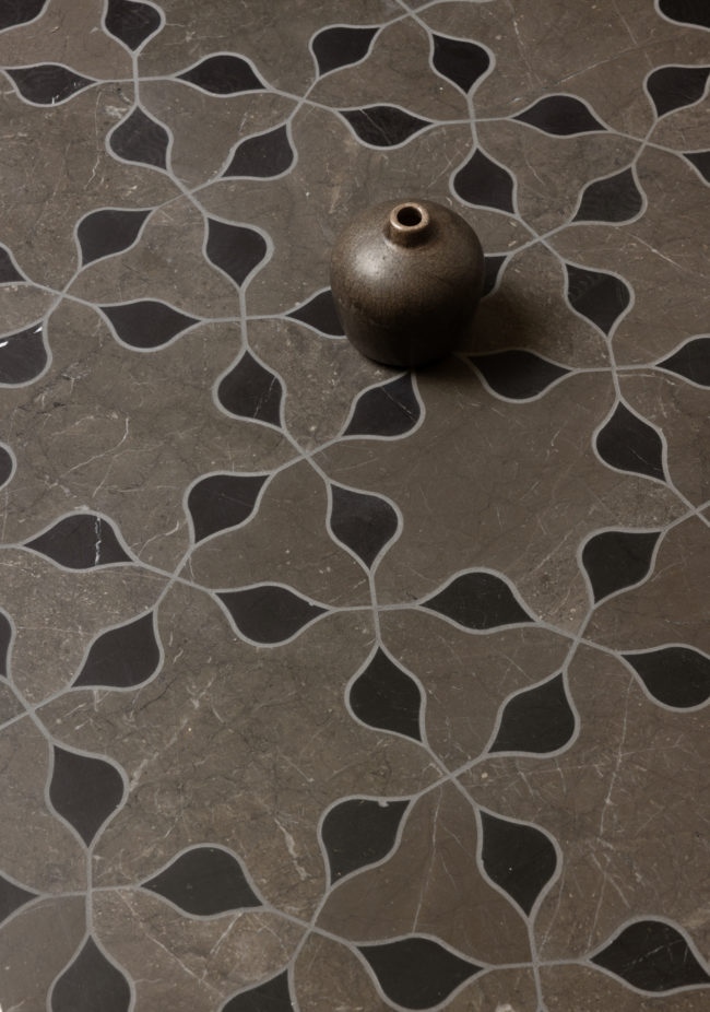 Dyad tile collection featuring Dark Olive and Tulip Black installation. brown and black geometric marble mosaic floor. 